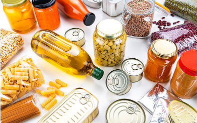 Assorted pantry items, jars, and cans displayed.